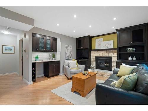 71 Edcath Road Nw, Calgary, AB - Indoor Photo Showing Living Room With Fireplace