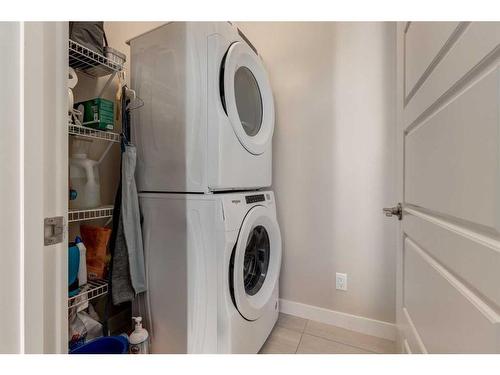 207 Sage Bluff Drive Nw, Calgary, AB - Indoor Photo Showing Laundry Room