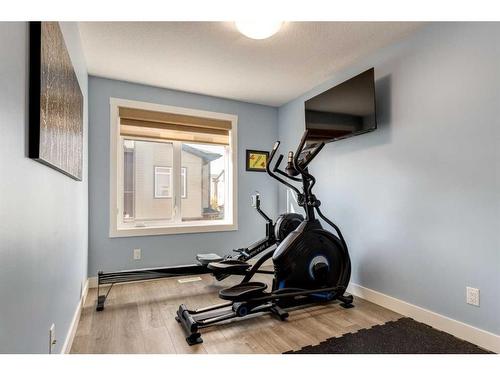 207 Sage Bluff Drive Nw, Calgary, AB - Indoor Photo Showing Gym Room