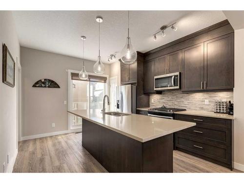 207 Sage Bluff Drive Nw, Calgary, AB - Indoor Photo Showing Kitchen With Upgraded Kitchen