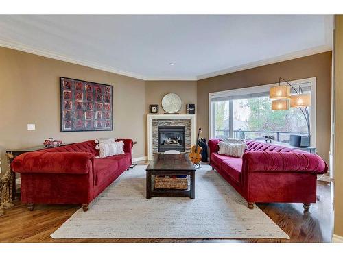 347 Sierra Madre Court Sw, Calgary, AB - Indoor Photo Showing Living Room With Fireplace