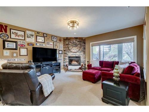 347 Sierra Madre Court Sw, Calgary, AB - Indoor Photo Showing Living Room With Fireplace