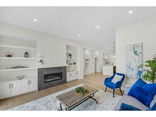 1410 43 Street Sw, Calgary, AB - Indoor Photo Showing Living Room With Fireplace