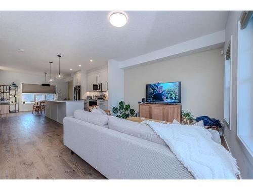 843 Carrington Boulevard Nw, Calgary, AB - Indoor Photo Showing Living Room