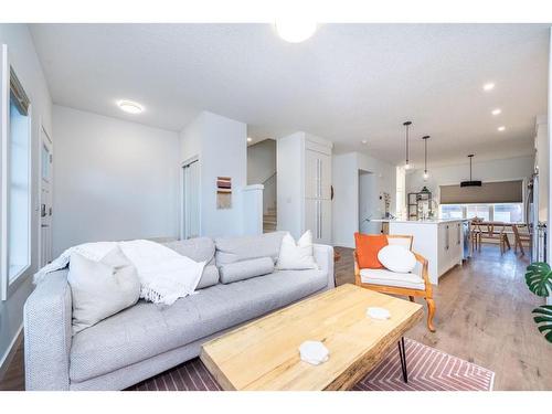 843 Carrington Boulevard Nw, Calgary, AB - Indoor Photo Showing Living Room