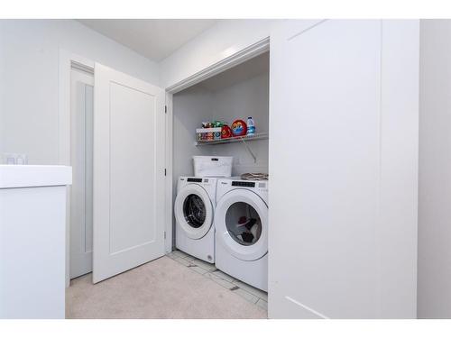 843 Carrington Boulevard Nw, Calgary, AB - Indoor Photo Showing Laundry Room