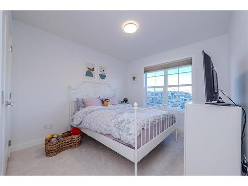 843 Carrington Boulevard Nw, Calgary, AB - Indoor Photo Showing Bedroom