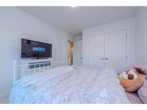 843 Carrington Boulevard Nw, Calgary, AB - Indoor Photo Showing Bedroom