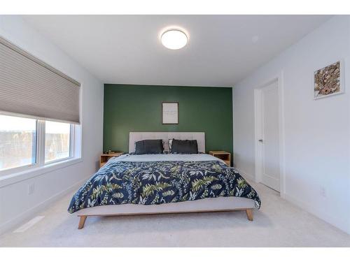 843 Carrington Boulevard Nw, Calgary, AB - Indoor Photo Showing Bedroom