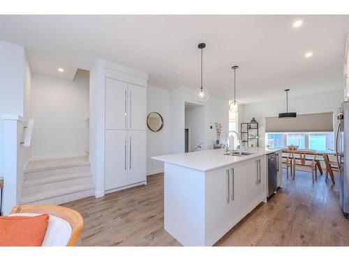 843 Carrington Boulevard Nw, Calgary, AB - Indoor Photo Showing Kitchen With Upgraded Kitchen