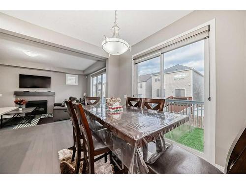 170 Cityscape Way Ne, Calgary, AB - Indoor Photo Showing Dining Room With Fireplace