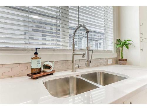 601-474 Seton Circle Se, Calgary, AB - Indoor Photo Showing Kitchen With Double Sink