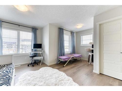 601-474 Seton Circle Se, Calgary, AB - Indoor Photo Showing Bedroom