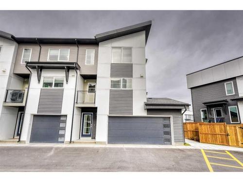 601-474 Seton Circle Se, Calgary, AB - Outdoor With Balcony With Facade