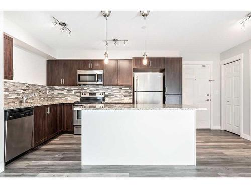 3109-279 Copperpond Common Se, Calgary, AB - Indoor Photo Showing Kitchen With Upgraded Kitchen