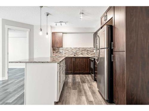 3109-279 Copperpond Common Se, Calgary, AB - Indoor Photo Showing Kitchen With Upgraded Kitchen