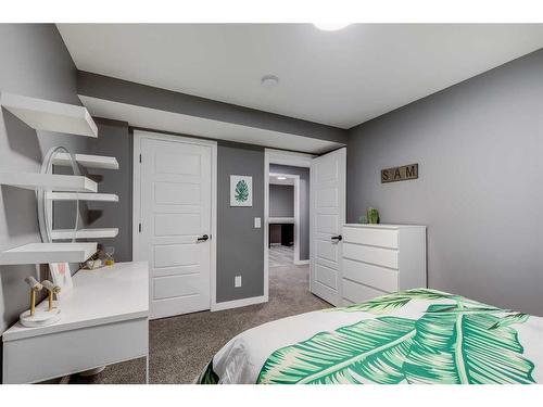 476 Reynolds Avenue Sw, Airdrie, AB - Indoor Photo Showing Bedroom