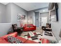 476 Reynolds Avenue Sw, Airdrie, AB  - Indoor Photo Showing Living Room 