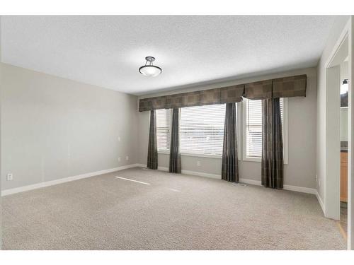 8 Sunset Close, Cochrane, AB - Indoor Photo Showing Other Room