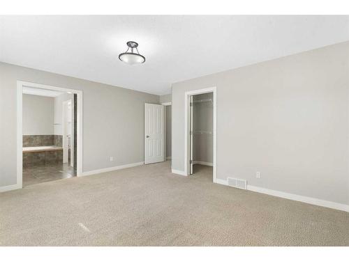 8 Sunset Close, Cochrane, AB - Indoor Photo Showing Other Room