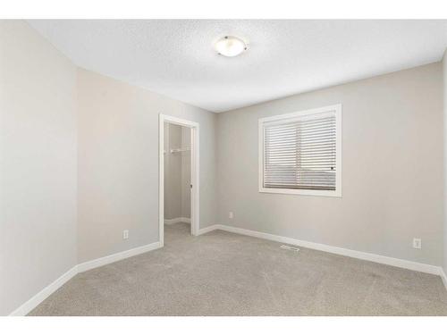 8 Sunset Close, Cochrane, AB - Indoor Photo Showing Other Room