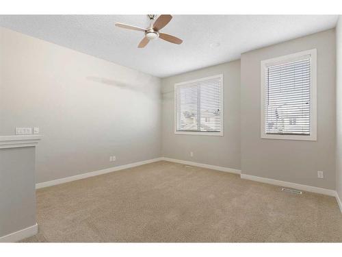 8 Sunset Close, Cochrane, AB - Indoor Photo Showing Other Room