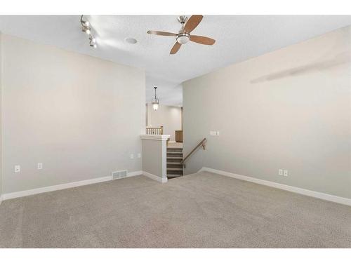 8 Sunset Close, Cochrane, AB - Indoor Photo Showing Other Room