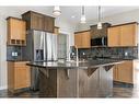 8 Sunset Close, Cochrane, AB  - Indoor Photo Showing Kitchen With Double Sink 