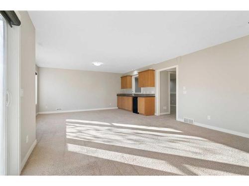 8 Sunset Close, Cochrane, AB - Indoor Photo Showing Other Room