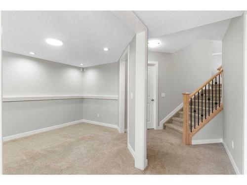 8 Sunset Close, Cochrane, AB - Indoor Photo Showing Other Room