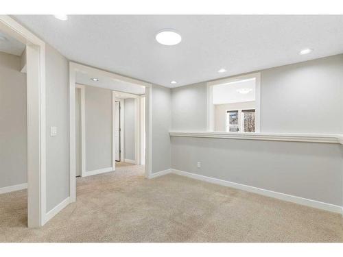 8 Sunset Close, Cochrane, AB - Indoor Photo Showing Other Room