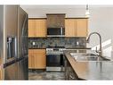 8 Sunset Close, Cochrane, AB  - Indoor Photo Showing Kitchen With Double Sink 