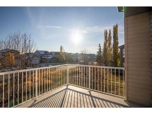 8 Sunset Close, Cochrane, AB - Outdoor With Balcony With Exterior