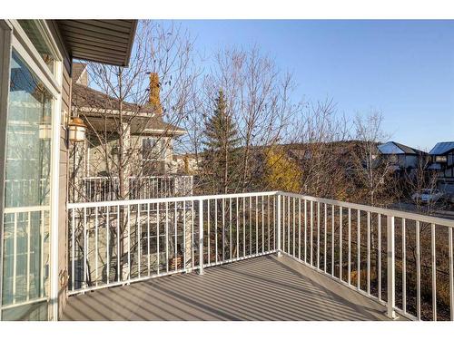 8 Sunset Close, Cochrane, AB - Outdoor With Balcony With Exterior