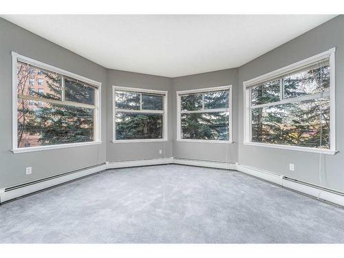 206-200 Lincoln Way Sw, Calgary, AB - Indoor Photo Showing Other Room