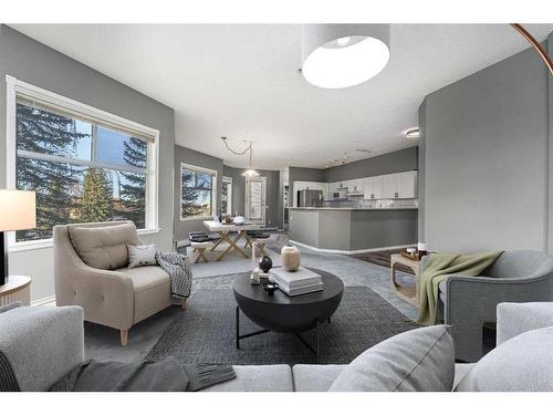 206-200 Lincoln Way Sw, Calgary, AB - Indoor Photo Showing Living Room