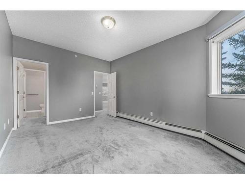 206-200 Lincoln Way Sw, Calgary, AB - Indoor Photo Showing Other Room