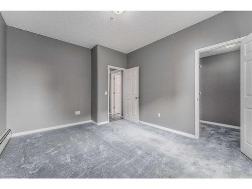 206-200 Lincoln Way Sw, Calgary, AB - Indoor Photo Showing Other Room