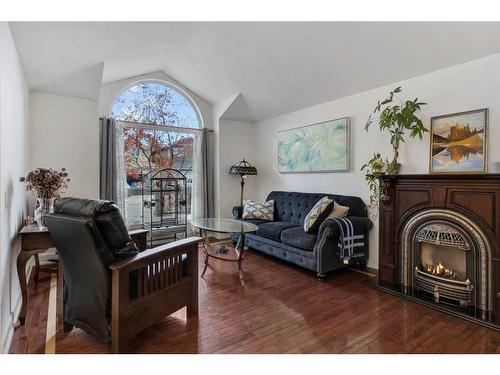 34 Sun Harbour Way Se, Calgary, AB - Indoor Photo Showing Living Room With Fireplace