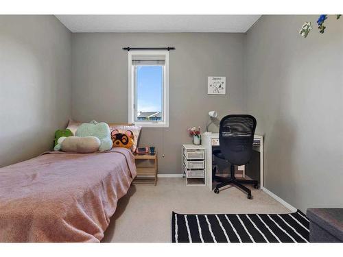 149 Patina Park Sw, Calgary, AB - Indoor Photo Showing Bedroom