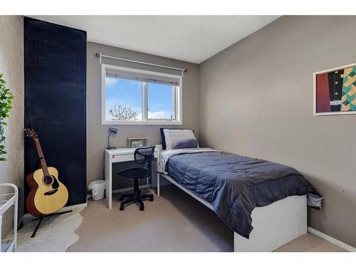 149 Patina Park Sw, Calgary, AB - Indoor Photo Showing Bedroom