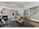 149 Patina Park Sw, Calgary, AB  - Indoor Photo Showing Living Room 