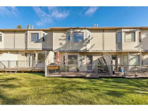 149 Patina Park Sw, Calgary, AB - Outdoor With Deck Patio Veranda