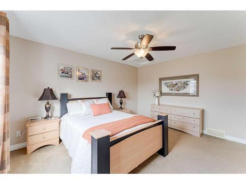 117 Springmere Grove, Chestermere, AB - Indoor Photo Showing Bedroom