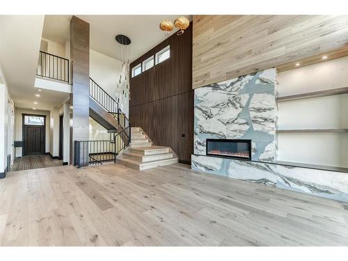 494 Rochester Terrace Nw, Calgary, AB - Indoor Photo Showing Other Room With Fireplace