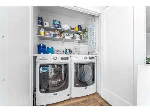 68 Coach Side Terrace Sw, Calgary, AB - Indoor Photo Showing Laundry Room