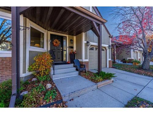 68 Coach Side Terrace Sw, Calgary, AB - Outdoor With Deck Patio Veranda With Facade