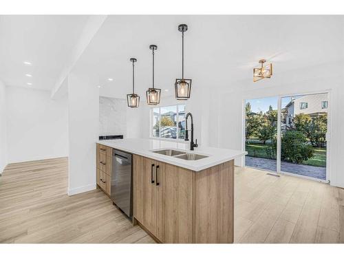 11113 Hidden Valley Drive Nw, Calgary, AB - Indoor Photo Showing Kitchen With Double Sink