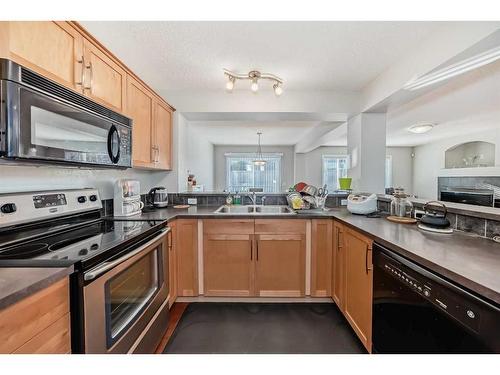 316 Panora Close Nw, Calgary, AB - Indoor Photo Showing Kitchen With Double Sink