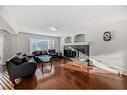 316 Panora Close Nw, Calgary, AB  - Indoor Photo Showing Living Room With Fireplace 